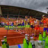 The runners line up for the start of the men’s race. Photo: Beer Mile Media