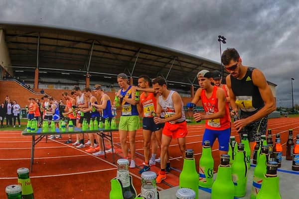 The runners line up for the start of the men’s race. Photo: Beer Mile Media