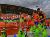 The runners line up for the start of the men’s race. Photo: Beer Mile Media