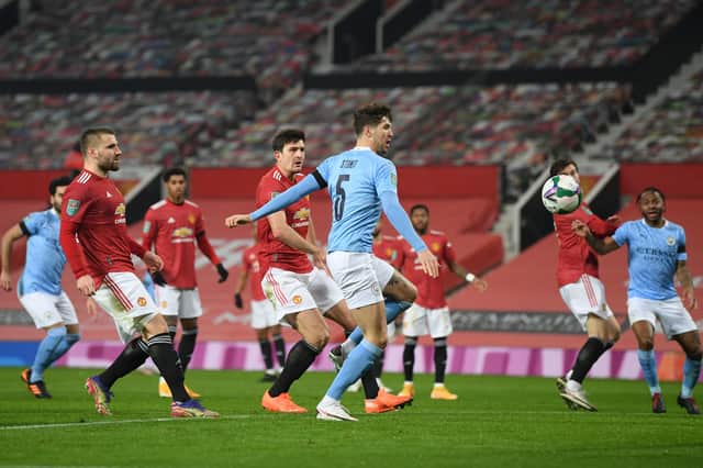 <p>John Stones scores for Manchester United in the derby. Credit: Getty.</p>