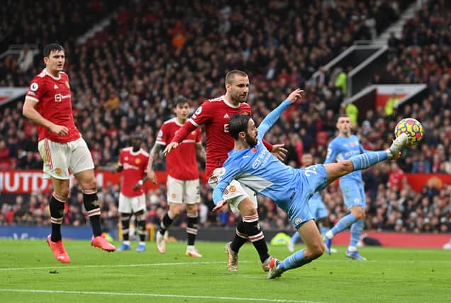 Bernardo Silva scores for Manchester City in the Manchester derby. Credit: Getty.