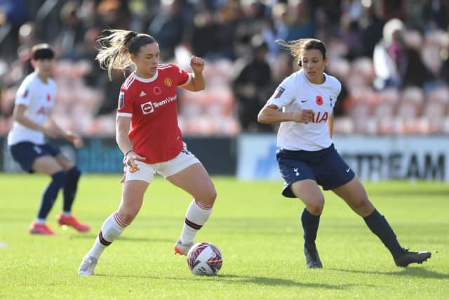 Kirsty Hanson of Manchester United in possession whilst under pressure from Rachel Williams of Tottenham Hotspur during the Barclays FA Women’s Super League match between Tottenham Hotspur Women and Manchester United Women Credit: Getty Images