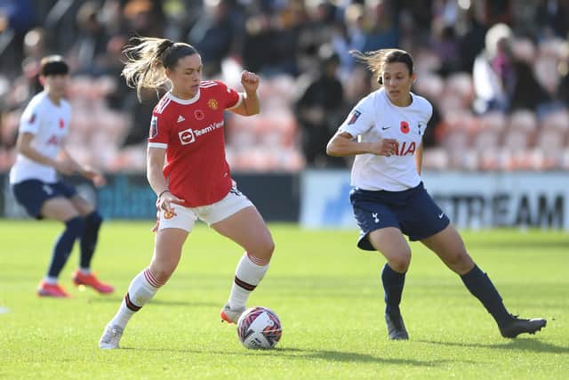 Kirsty Hanson of Manchester United in possession whilst under pressure from Rachel Williams of Tottenham Hotspur during the Barclays FA Women’s Super League match between Tottenham Hotspur Women and Manchester United Women  Credit: Getty Images