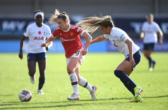 Kirsty Hanson of Manchester United battles for possession with Shelina Zadorsky of Tottenham Hotspur during the Barclays FA Women’s Super League match  Credit: Getty Images 