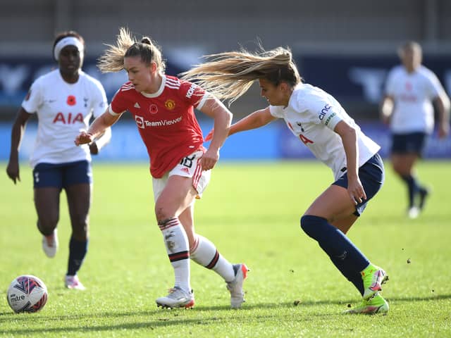 Kirsty Hanson of Manchester United battles for possession with Shelina Zadorsky of Tottenham Hotspur during the Barclays FA Women’s Super League match  Credit: Getty Images 