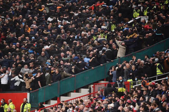 Manchester City’s supporters at Old Trafford Credit: Getty Images