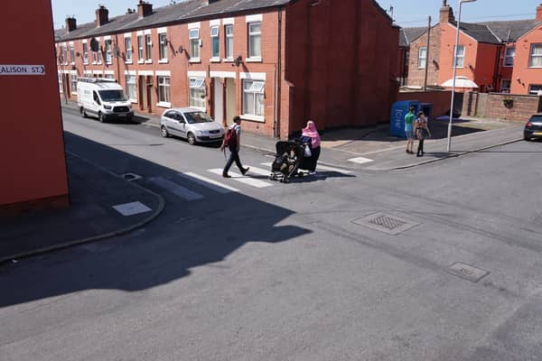 A visualisation of a  prescribed zebra crossing on a side road in Moss Side