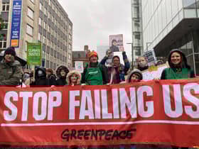 Protestors march through Manchester on the Global Day of Action for climate justice and environmental action, held during the COP26 summit. Photo: Greenpeace
