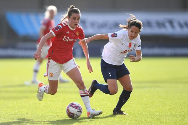  Ella Toone of Manchester United battles for possession with Maeva Clemaron of Tottenham Hotspur Credit: Getty Images
