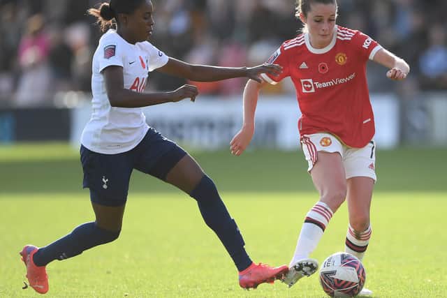 Ella Toone of Manchester United is challenged by Jess Naz of Tottenham Hotspur Credit: Getty Images