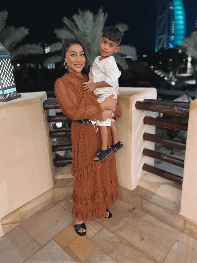 <p>Heera Muslam with son Adam</p>