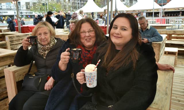 Manchester Christmas Markets  From left, Sue Hollister and Carole and Emma Barben  Photo: David Hurst/ JPI
