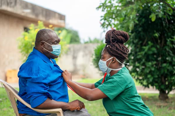 A care worker Credit: Shutterstock/ posed by models