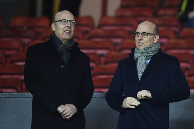 Avram Glazer (L) and Joel Glazer (R) attending a United game in 2015. Credit: Getty.