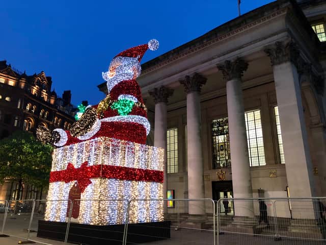 <p>Giant Santa all lit up in Manchester for Christmas 2021 Credit: MCC</p>