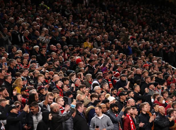 <p>Manchester United supporters at Old Trafford. Credit: Getty.</p>
