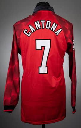  Eric Cantona red and white Manchester United no.7 home shirt Credit: Graham Budd Auctions / SWNS