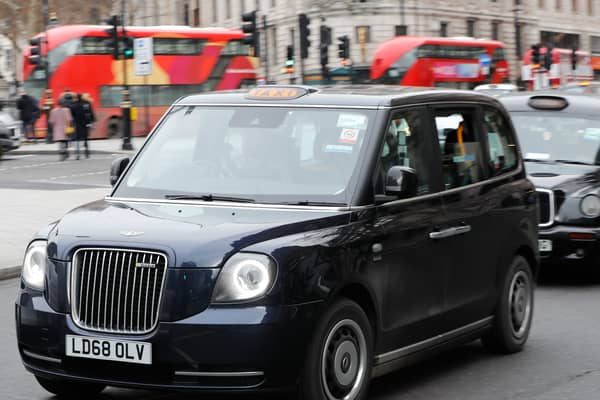 A London Electric Vehicle Company (LEVC) taxi being driven in the capital city.  Photo: Tolga Akmen/AFP via Getty Images