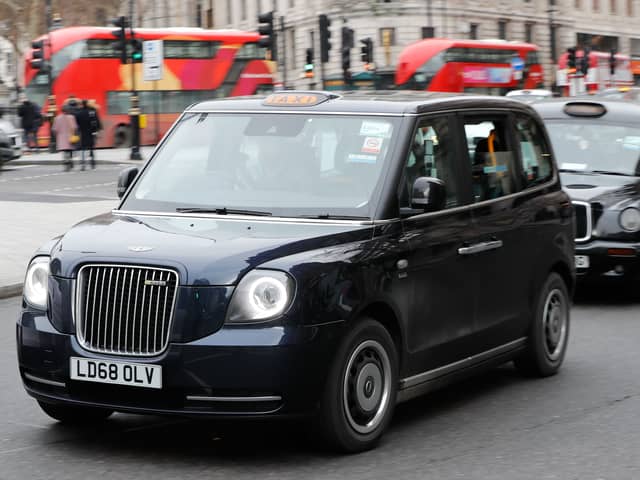 A London Electric Vehicle Company (LEVC) taxi being driven in the capital city.  Photo: Tolga Akmen/AFP via Getty Images