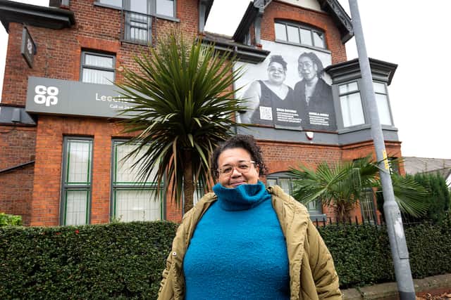 Ekua Bayunu, co-founder of Global Arts Manchester, with the mural