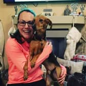 Hayley Egan with one of her dogs Milo when he first arrived 