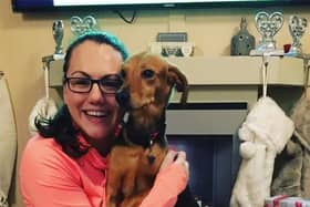 Hayley Egan with one of her dogs Milo when he first arrived 