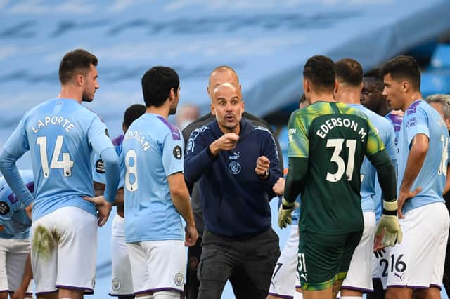 Pep Guardiola coaches his players during game against Liverpool. Credit: Getty.