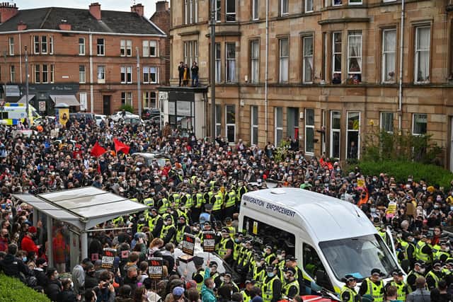 A huge public outcry prevents an immigration raid taking place in Glasgow. Photo: Jeff J Mitchell/Getty Images