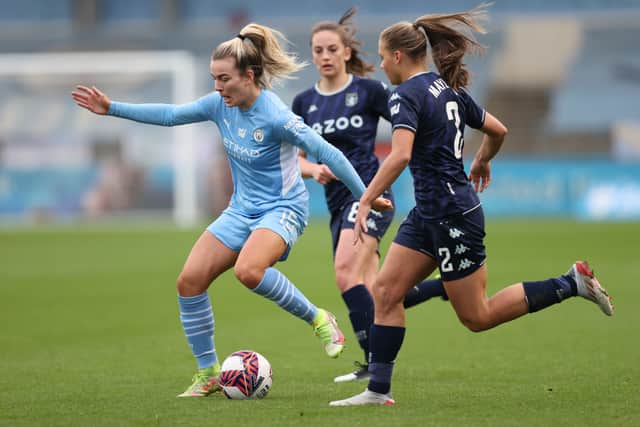 auren Hemp of Manchester City Women is tracked by Sarah Mayling of Aston Villa Women Credit: Getty