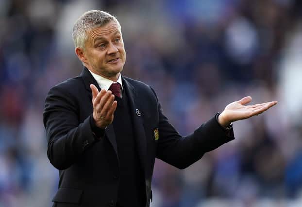 How have former players and pundits reacted to Ole Gunnar Solskjaer’s dismissal as Man Utd manager? (image: PA)