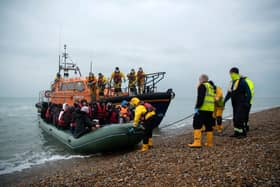 An RNLI lifeboat rescues asylum seekers in the Channel 
