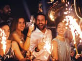 Celebrating new year with friends  Credit: Shutterstock