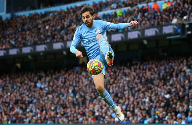 <p>Bernardo playing for Manchester City. Credit: Getty.</p>