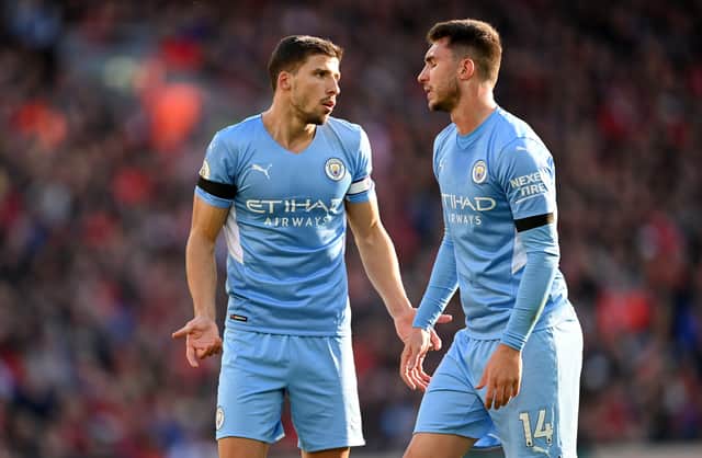 Ruben Dias and Aymeric Laporte. Credit: Getty.
