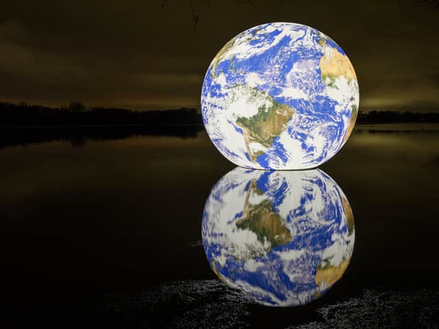 Floating Earth by Luke Jerram at Pennington Flash. Photo: Wigan Council