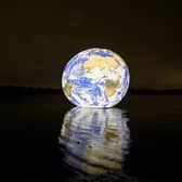 Floating Earth by Luke Jerram at Pennington Flash. Photo: Wigan Council