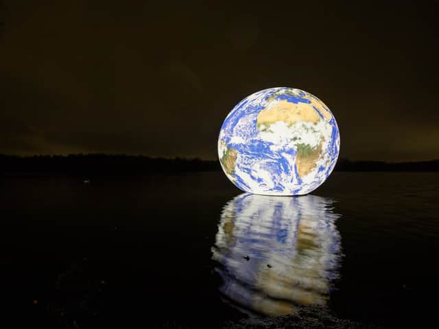 Floating Earth by Luke Jerram at Pennington Flash. Photo: Wigan Council