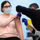 A woman receiving her Covid-19 vaccination booster (Image: Getty Images)