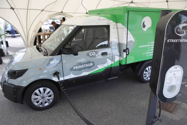 An electric delivery van being charged in Germany. Photo: Getty Images