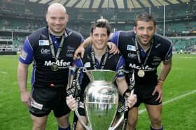 (L to R) The Sale Front Row of Stuart Turner, Andy Titterrell and Lionel Faure pose with the trophy following their team’s victory during the Guinness Premiership Final between Sale Sharks and Leicester Tigers at Twickenham on May 27, 2006 Credit: Getty