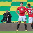 Harry Maguire and Mason Greenwood in an FA Cup tie against Norwich City last year Credit: Getty