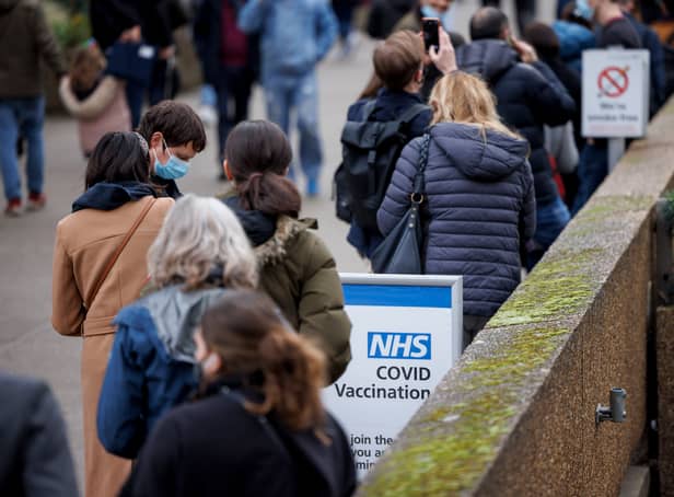 <p>Some Covid drop-in centres have experienced queues but the NHS says it will work seven days a week to deliver (Image: Getty Images)</p>
