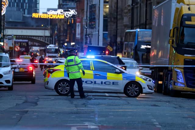 Deansgate in Manchester was closed on Monday following reports of a man with a gun Credit: Phil Taylor / SWNS