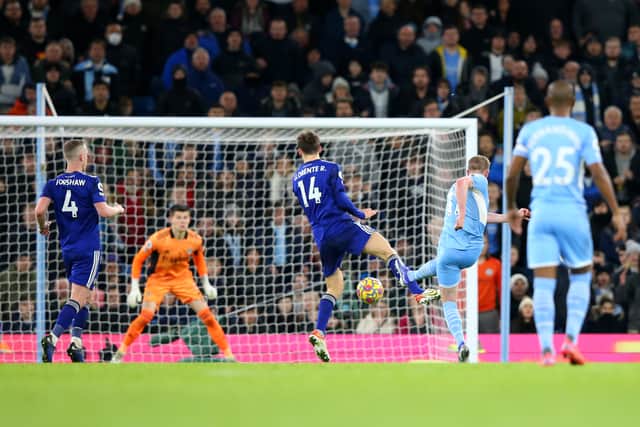 Kevin De Bruyne of Manchester City scores their side's fifth goal past Illan Meslier of Leeds United during the Premier League match between Manchester City and Leeds United at Etihad Stadium 