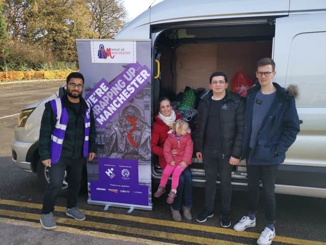The Wrap Up appeal with a vanload of coats collected by members of The Church of Jesus Christ of Latter-day Saints  