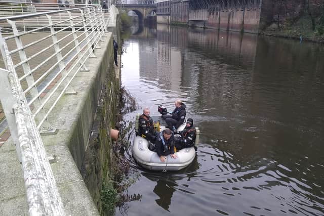 Police search teams hunt for missing person Charley Gadd in the River Irwell, near the Lowry Hotel, Manchester  Credit: SWNS