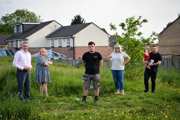 Andy Burgess, Michelle Done, Aaron Davies, Joanne Miles, Luke Wilkinson and his son Evan, 4 are concerned about the footpath Credit: LDRS