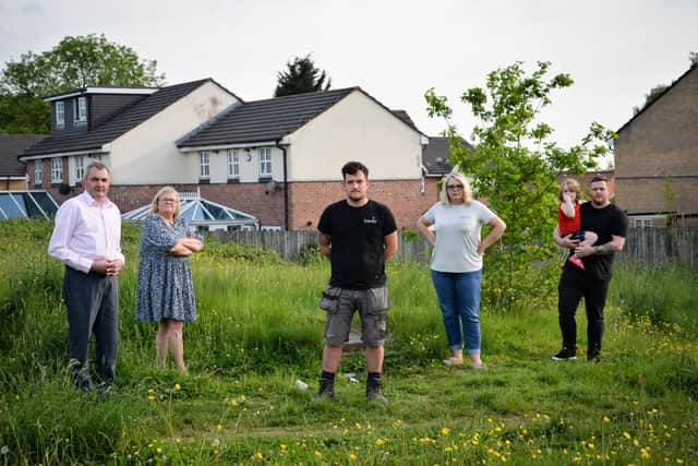 <p>Andy Burgess, Michelle Done, Aaron Davies, Joanne Miles, Luke Wilkinson and his son Evan, 4 are concerned about the footpath Credit: LDRS</p>