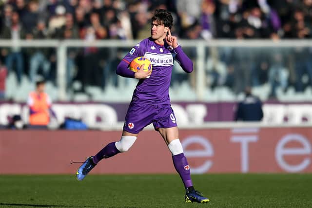 Dusan Vlahovic of ACF Fiorentina  celebrates after scoring the 1-2 goal during the Serie A match between ACF Fiorentina and US Sassuolo at Stadio Artemio Franchi on December 19, 2021