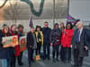 Care workers present Greater Manchester leaders with a petition for a living wage